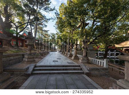 Empty Stone Slab Pathway Through Ancient Japanese Shrine
