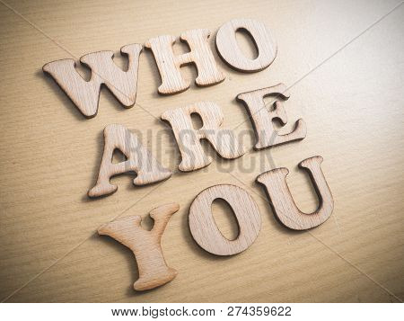 Who Are You In Wooden Words Letter, Motivational Self Development Business Typography Quotes Concept