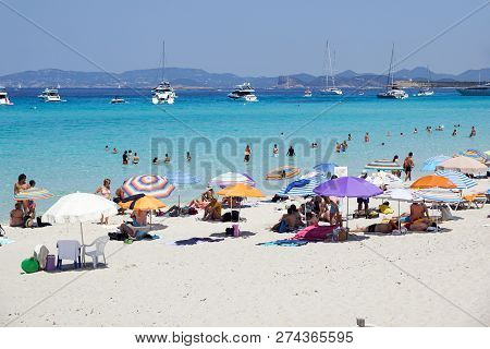 Formentera, Spain, July 19 2018: People On The Sandy Beach On Formentera, Spain.
