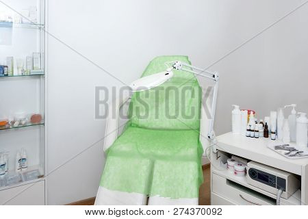 Podology Treatment. Podiatrist Chair In Modern Clinic. Podiatry Doctor Or Dermatologist Working Plac