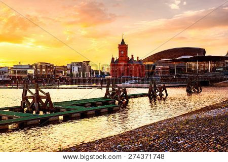 Waterfront At Night In Cardiff, Uk. Sunset Colorful Sky At Cardiff Bay.