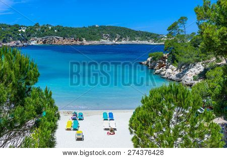 Ibiza, Spain - May 19, 2013:  Tourists In The Beach Of Cala Xarraca