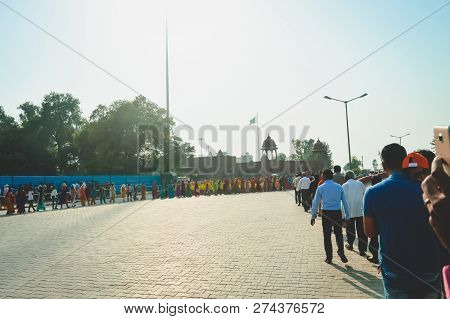 Wagha Border, Amritsar, Punjab, India - June, 2017. People Going To Attend Lowering Of Flags Ceremon