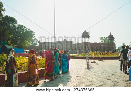 Wagha Border, Amritsar, Punjab, India - June, 2017. People Going To Attend Lowering Of Flags Ceremon