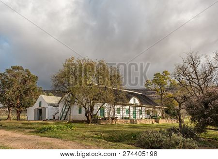 Kromrivier, South Africa, August 25, 2018: An Historic Farm House And Barn At Kromrivier Cederberg P