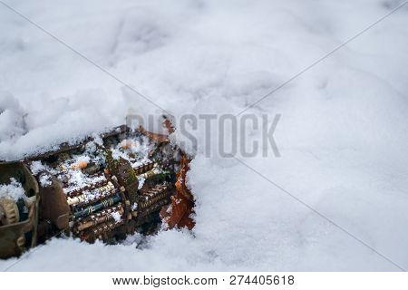 Old Tv Tuner Channel Selector With Moss In Snow