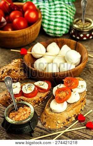 Traditional Italian Mozzarella Cheese On A Wooden Board. Healthy Cheese. Dairy Products. Mozzarella 