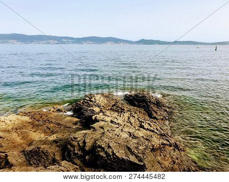 View Of The Ocean From Above The Rocks In Sanxenxo Galicia Spain During A Summer Day