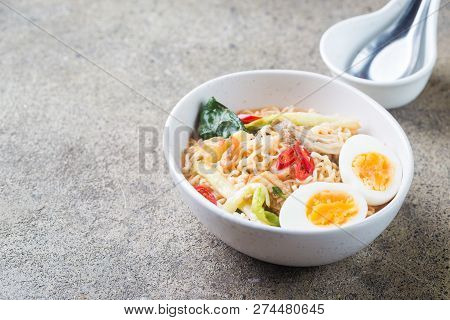Japanese Ramen Noodle With Chicken, Shiitake Mushroms And Egg In White Bowl