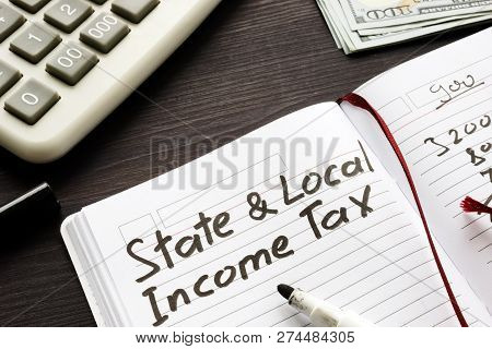 State And Local Income Tax Written In A Note.