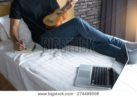 Young Man Write A Song Or Music