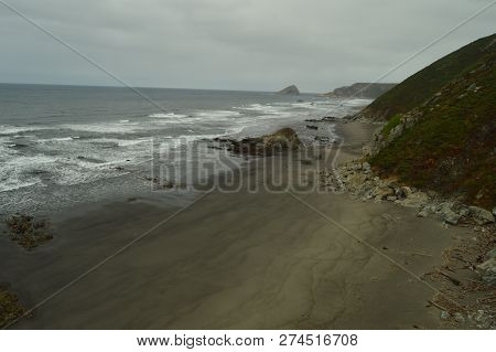 Beautiful Rock In The Center Of Los Quebrantos Beach On A Rainy Day. July 30, 2015. Landscapes, Natu