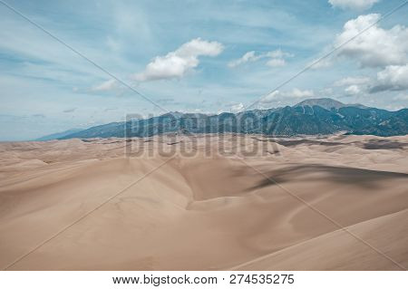 A View Of Giant Desert Sand Dunes In Great Sand Dunes National Park In Colorado, Usa