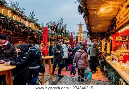 Dresden, Germany - December 14, 2018: View Of The Christmas Decorations, Toys And Scenery Houses On 