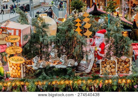 Dresden, Germany - December 14, 2018: View Of The Christmas Decorations, Toys And Scenery Houses On 