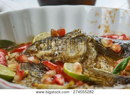 Baked Grey Mullet , Middle Eastern Cuisine Levant, Traditional Assorted Dishes, Top View