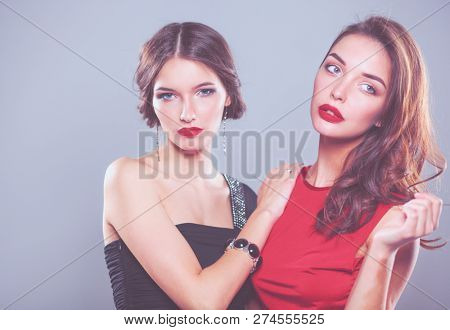 Two young beauty women standing together . Two young beauty wome