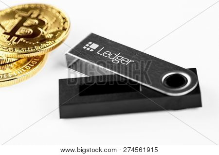 UKRAINE, ROVNO - ON DECEMBER 2: Ledger hardware wallet for cryptocurrency on a white background