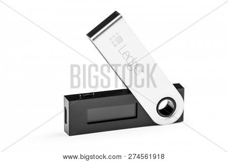 UKRAINE, ROVNO - ON DECEMBER 2: Ledger hardware wallet for cryptocurrency on a white background