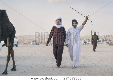 Man With Camels At The Million Street Where Camels Are Being Bought And Sold