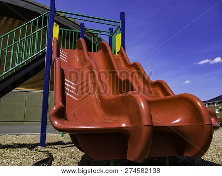Red In Color It Is Located In One Of The Amusement Parks. She Is Like A Kind Of Plastic Shell. A Rea