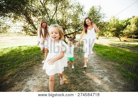 A Large Family With Homosexual Parents. Two Mothers.