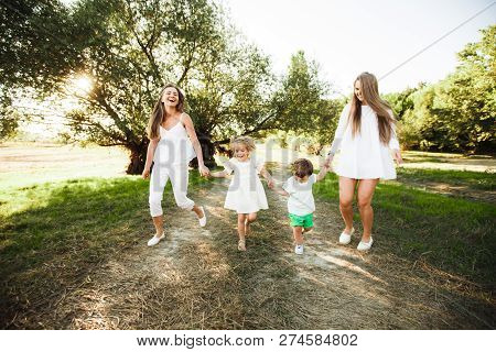 A Large Family With Homosexual Parents. Two Mothers.