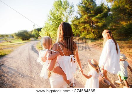 A Large Family With Homosexual Parents. Two Mothers.