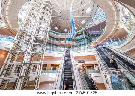 TOKYO, JAPAN - September 1, 2015: Passengers enter Haneda Airport. Haneda is one of the two primary airports that serve the Greater Tokyo Area.