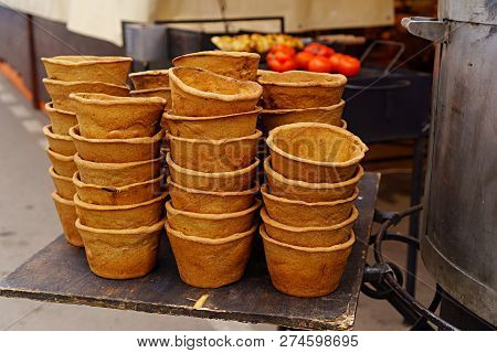 Plates Of Bread For Bogracs. Hungarian National Dish - Bogracs, Close-up In A Bread Plate.