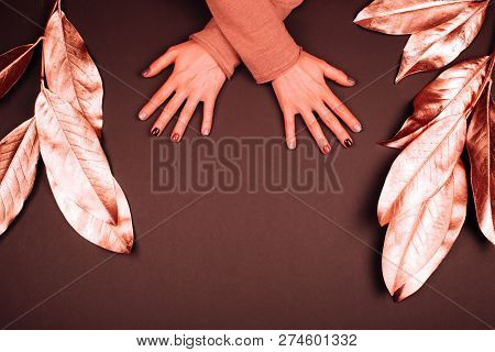 Holiday Beautiful Manicure With Golden Decorations. Coral Color.