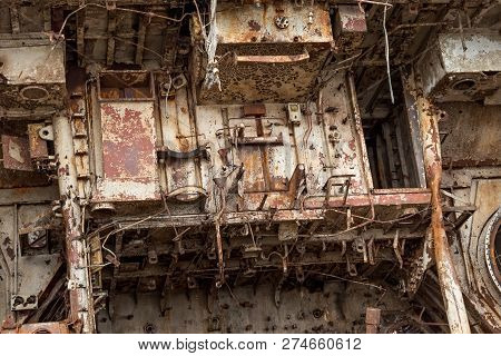 Internal Parts Of Decommissioned Marine Ship That Was Cut And Left On The Shore.