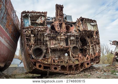 Huge Rusty Pieces Of Decommissioned Marine Ship That Was Cut And Left On The Shore.