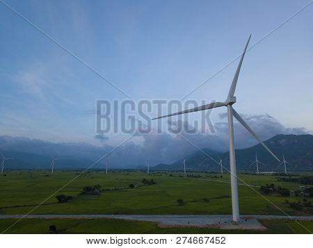 Wind Turbines Farm Or Windmill On A Summer Day. High-quality Stock Photo Image Wind Turbine Or Windm