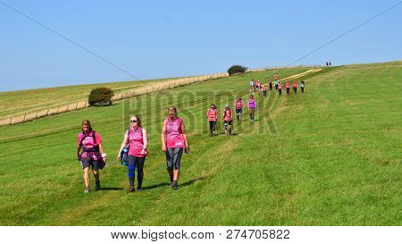 Alciston, East Sussex, England - September 01, 2018 : Race For Life Lady Walkers On The South Downs.