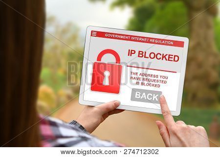 Ip Address Blocked Concept, Girl With Tablet Pc On Blurred Nature Background