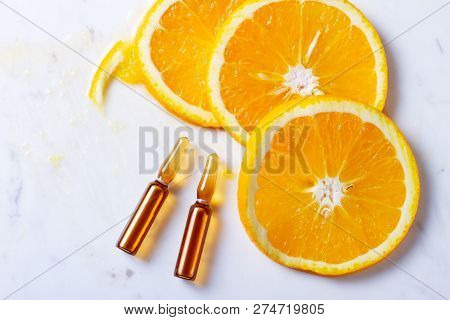 Vitamin C, Natural Anti Aging Cosmetics Ampulas With Oranges