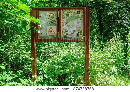 Hainault Country Park, Essex, Uk - June 6, 2018: Glass Fronted Notice Board Giving Directions On A M