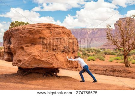 Girl Pushing Big Stone Hard, Impossible And Useless Concept