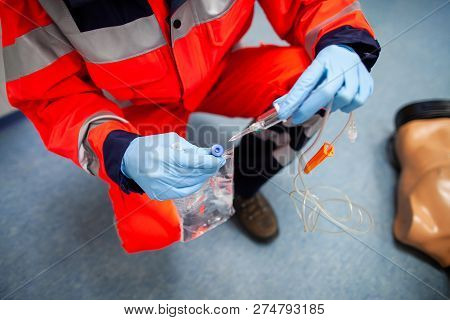 German Paramedic Trains Emergency Basics On A Puppet