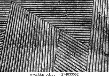 Groovy Concrete Wall With Pattern Of Lines In The Park