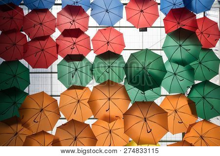 Colorful Umbrellas Hanging On The Ceiling As Modern Decoration In Kuala Lumpur.