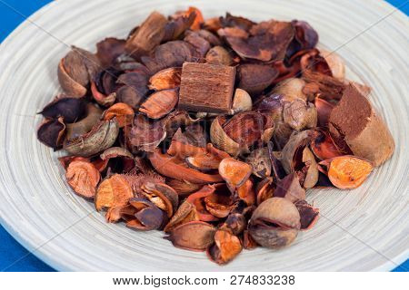Potpourri In The Wooden Plate. Close Up
