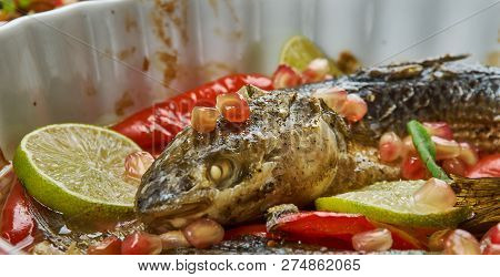 Baked Grey Mullet , Middle Eastern Cuisine Levant, Traditional Assorted Dishes, Top View