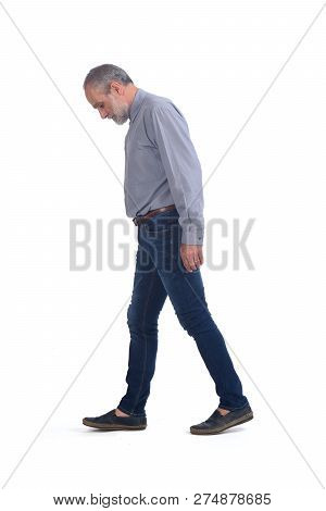Middle-aged Man With Blue Jeans And Shirt On White Background
