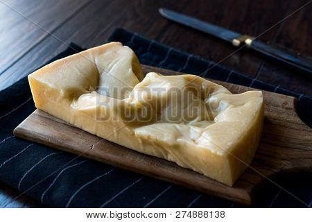 Turkish Traditional Gravyer / Gruyere Cheese From Kars On Wooden Surface
