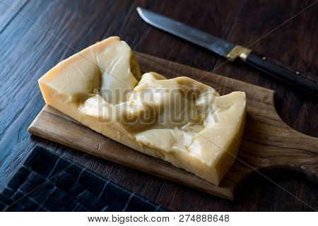 Turkish Traditional Gravyer / Gruyere Cheese From Kars On Wooden Surface