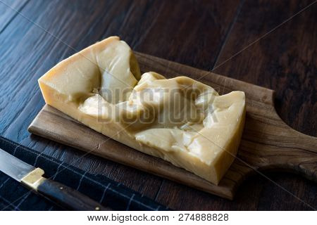 Turkish Traditional Gravyer / Gruyere Cheese From Kars On Wooden Surface