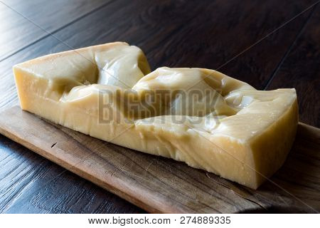 Turkish Traditional Gravyer / Gruyere Cheese From Kars On Wooden Surface