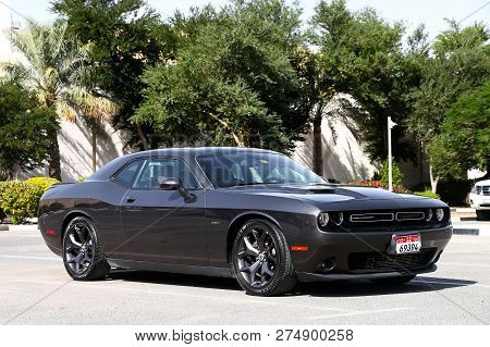 Dubai, Uae - November 15, 2018: Black Sportscar Dodge Challenger R/t In The City Street.